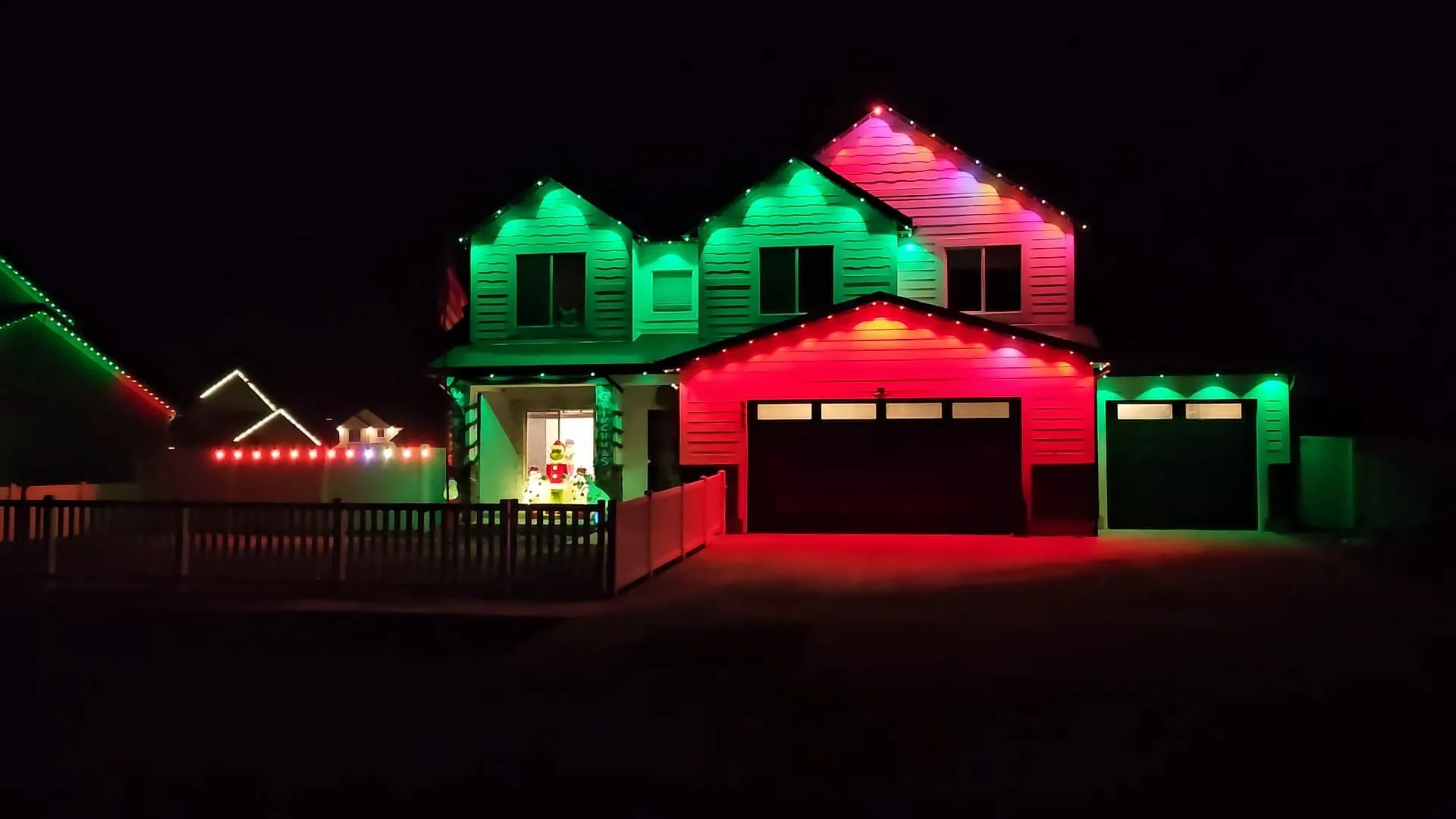 Cache Valley home running Christmas red and green permanent lighting